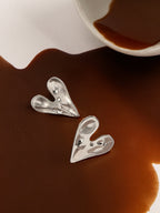 Haute Sauce The Dented-Coeur Stud Earrings - Metallic Silver