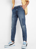 Campus Sutra Distressed Patterned Denim Jeans