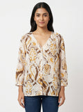 Women's Cream Abstract Print V-Neck Relaxed Top
